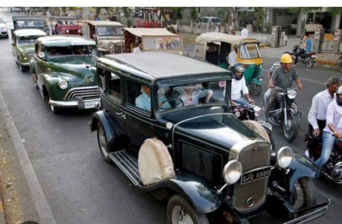 May be an image of 5 people, car and street